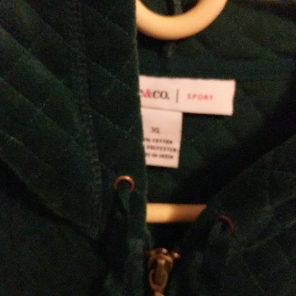 Worn 2x hunter green hoodie with gold zipper and f